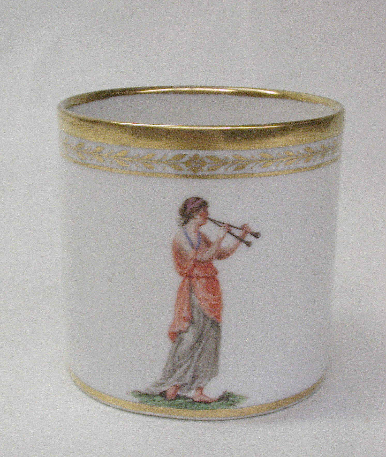 Original museum photograph of the porcelain cup with gold rim and painted decoration